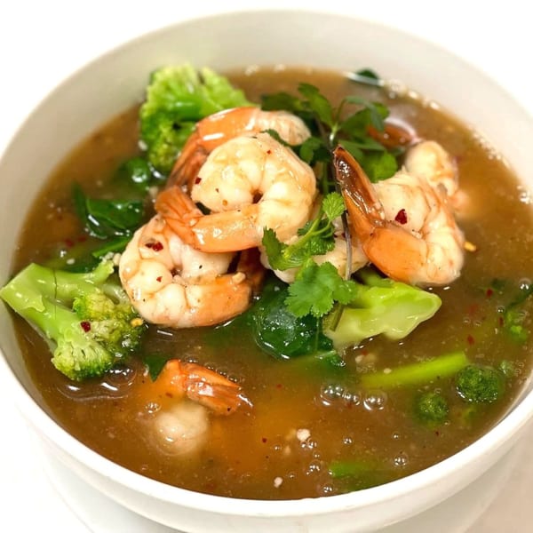 Siri Thai Cuisine's shrimp and broccoli in a savory brown sauce, garnished with fresh cilantro.