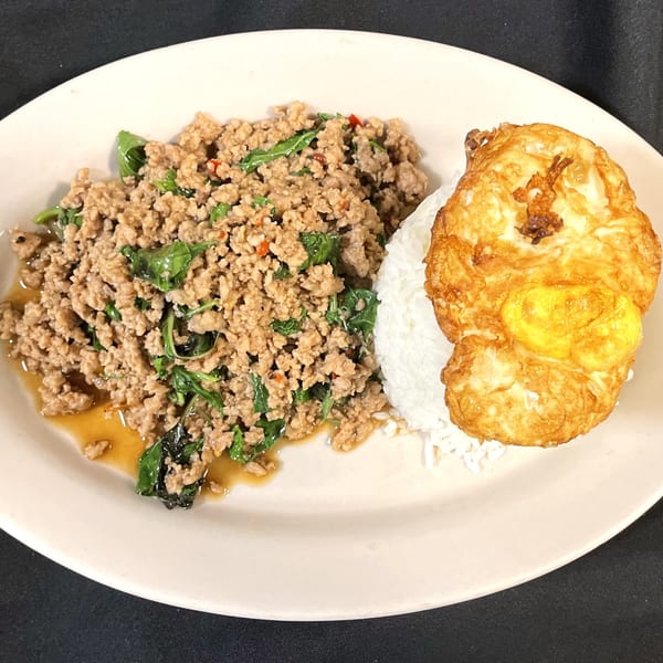 Siri Thai Cuisine's Pad Krapow with minced meat, basil, rice, and a fried egg.